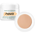 Super high concealer jar with beige cream and 'novo' branding on a white background